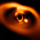 Imagen del nuevo planeta. El planeta es la burbuja brillante, y el círculo negro es el instrumento que bloquea la luz de la estrella central